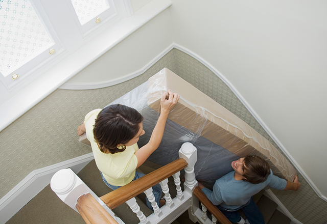 best way to move a mattress up stairs